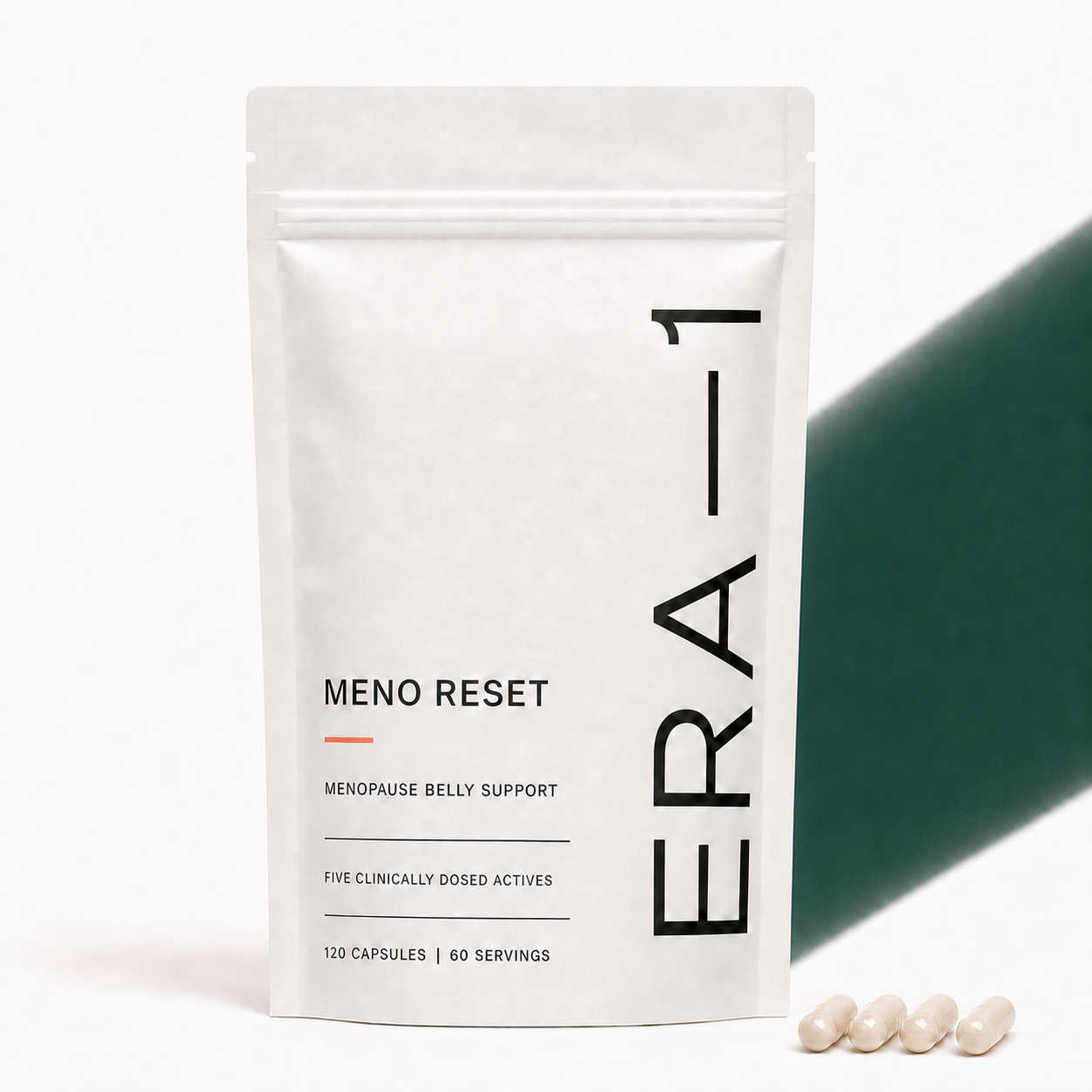 Modern ERA-1 Meno Reset pouch on a deep bottle-green studio background